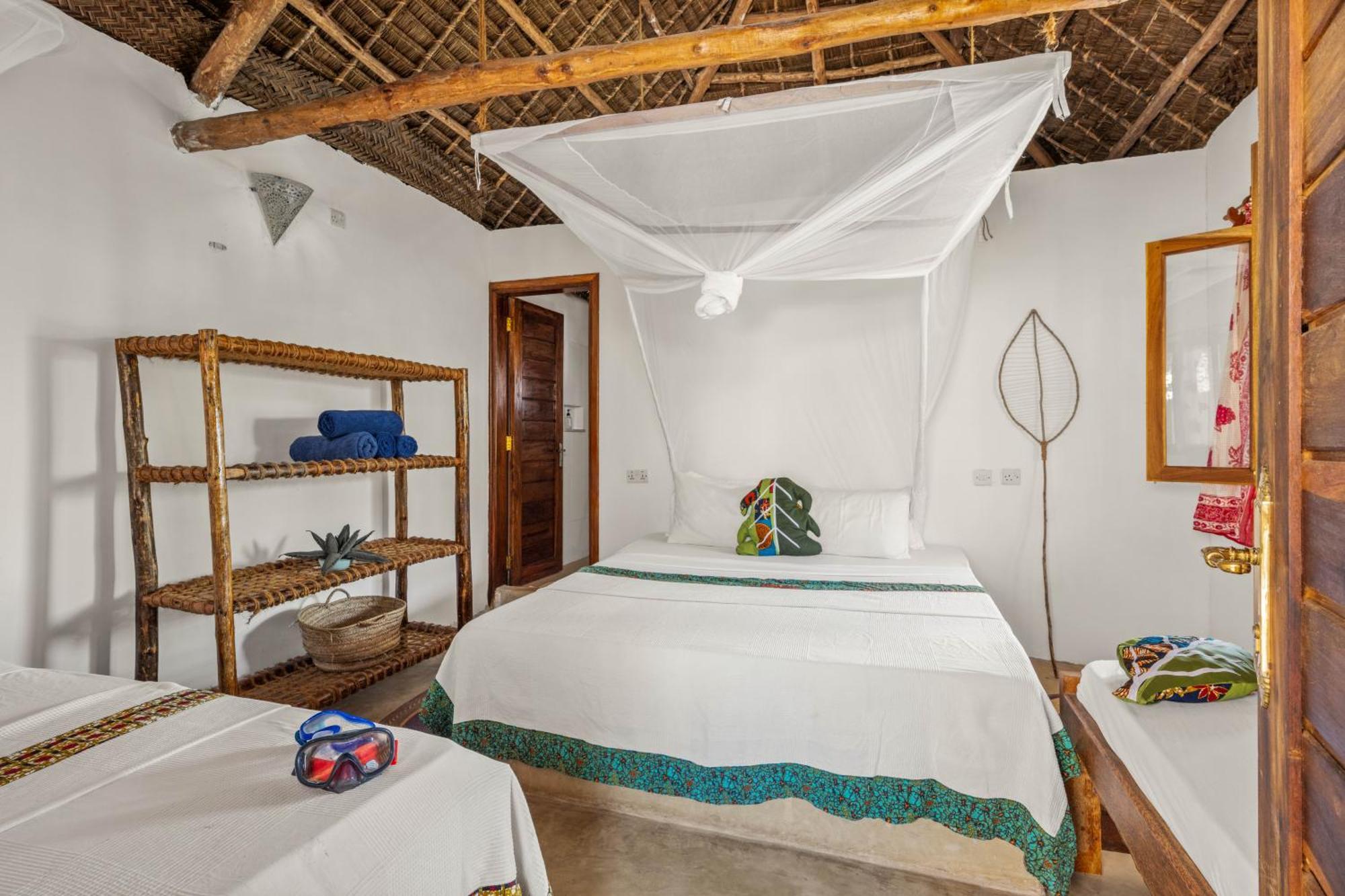 Shanuo Beach Bungalows Michamvi Habitación foto