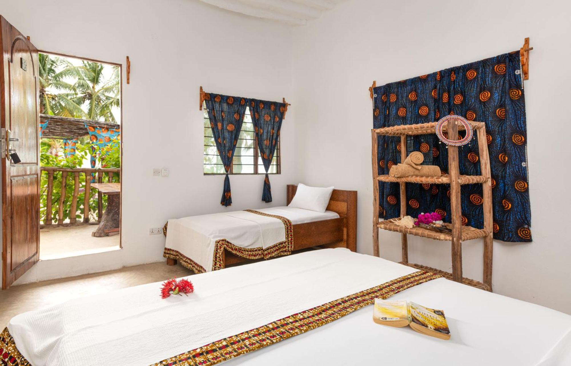 Shanuo Beach Bungalows Michamvi Habitación foto